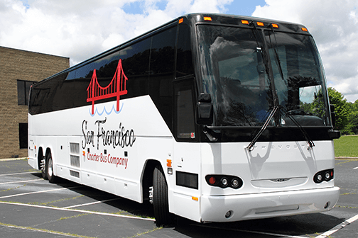 a plain white charter bus with a 